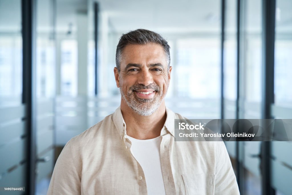 Headshot of First Lastname<br />
$100,000